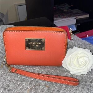 Michael Kors Vibrant Orange Wristlet 5”L x 3.5 H New🌼